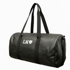 borsone in pelle nero con iniziali stampate color argento LM e cuore